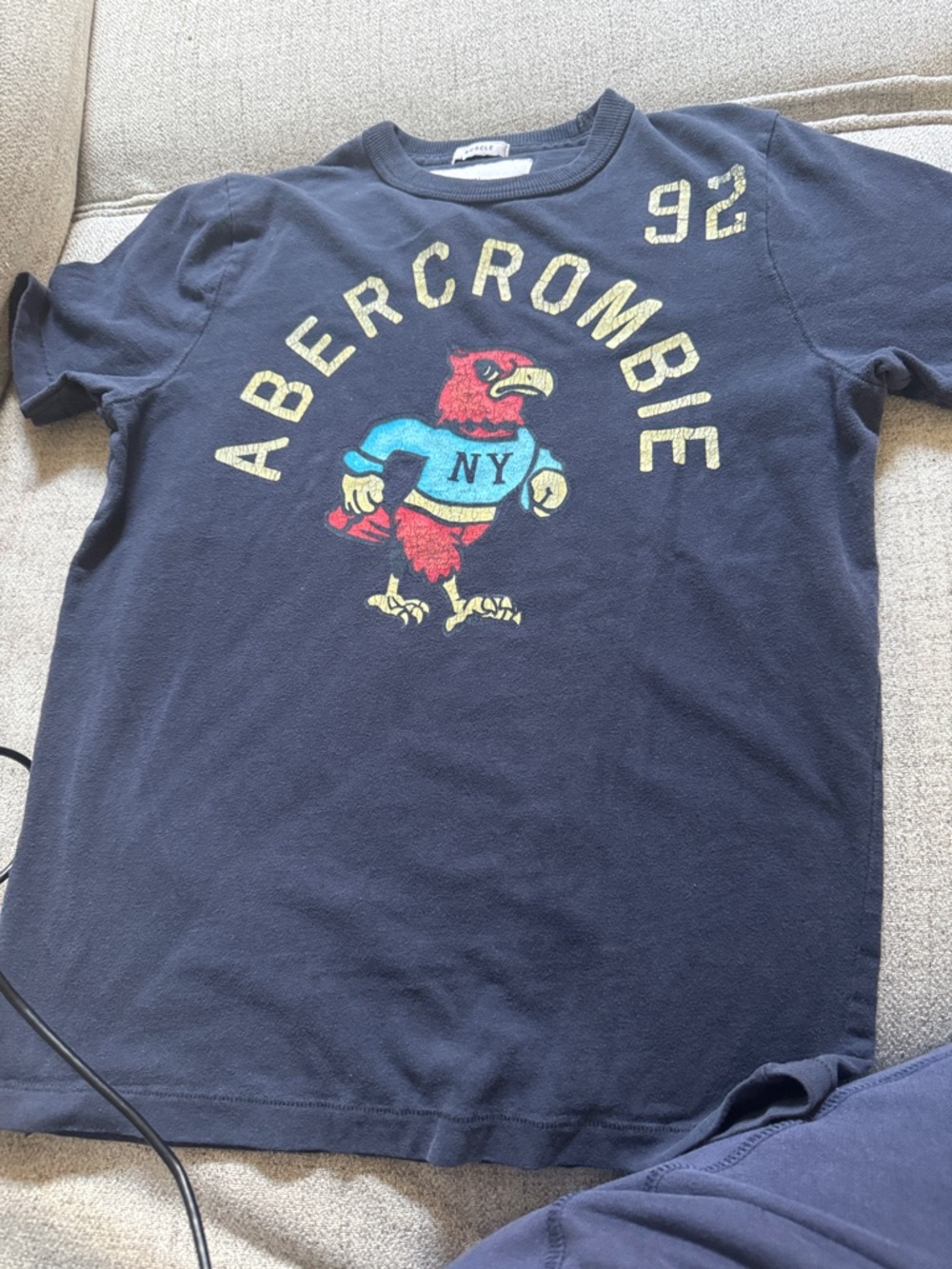 Abercrombie & Fitch Kids Navy Tee with Red Mascot and Yellow Logo